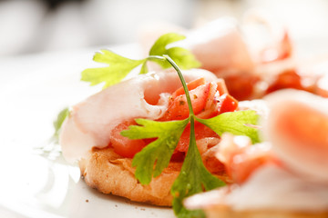 Bruschetta with tomato and ham