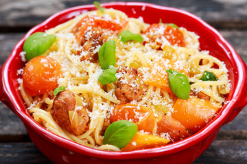 Sausage Pasta spaghetti with summer vegetables, cheese