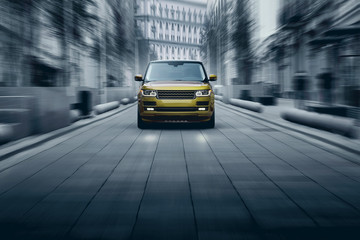 Obraz premium Premium car fast drive on road in the city at daytime