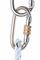 Steel carabiners with rope isolated on white background