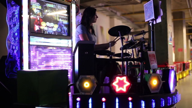 Woman playing the drum installation