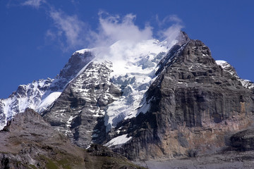 Swiss mountain summit: Jungfrau wrapped in clouds