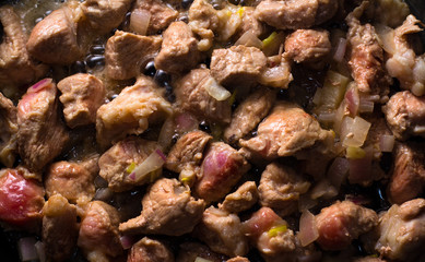 The process of roasting meat for goulash