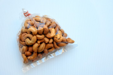 Cashew nuts packaged in a clear plastic bag