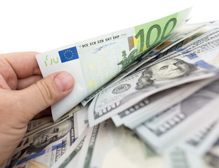 euro in his hand on a white background