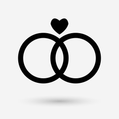 Marriage rings couple with a heart icon