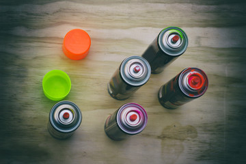 Spray paint cans