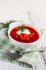 Ukrainian and Russian national red soup borsch with sour cream