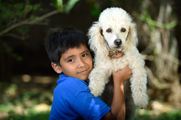 white poodle friend of boy