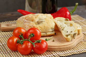 Sliced bread Ciabatta and vegetables