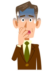 青ざめる年配ビジネスマンの上半身