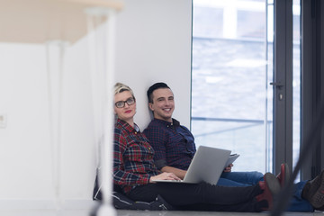 startup business, couple working on laptop computer at office