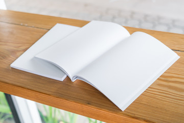 Fototapeta premium Blank catalog, magazines,book mock up on wood background