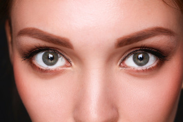 Fototapeta premium Close up portrait of beautiful young woman face