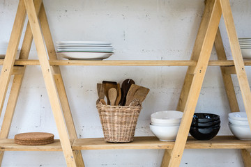 Fototapeta na wymiar Kitchen wood shelf with Home Kitchen Wares