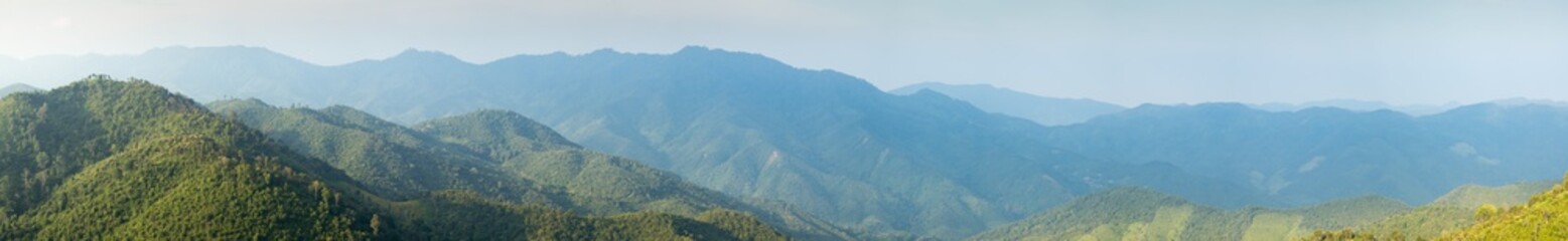 Panorama sky, forest and mountains.