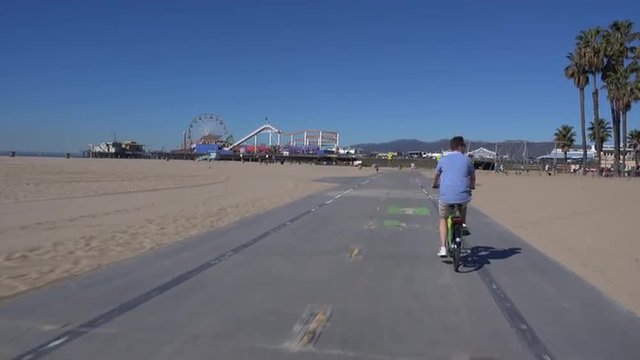 SANTA MONICA, CA - Circa February, 2016: A bicycle rider's POV of traveling near the Santa Monica Pier. Part 4 of 8. 
