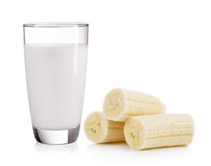 glass of milk and banana isolated on white background