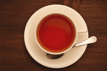 Cup of tea on wooden table