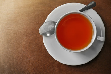 Cup of tea on wooden table