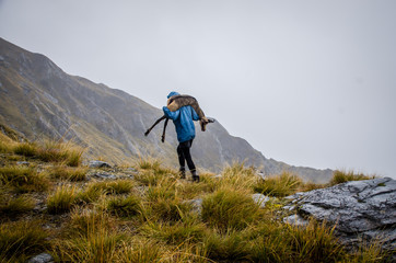 hunter carrying chamois