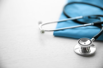 Stethoscope and medical equipment on a light background