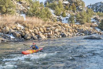 paddling whitewater kayak