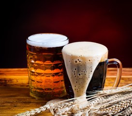 Drink. two glasses beer red background!