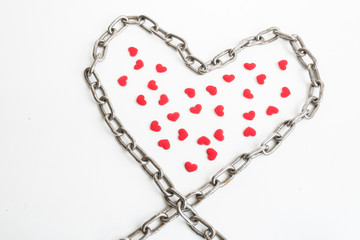 heart chains and litlle red hearts in side on isolated background