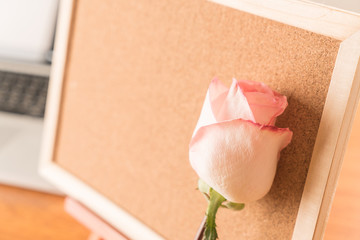 rose with paper note