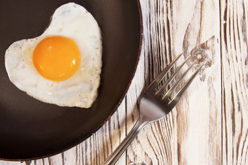 Fried egg on a cast iron pan