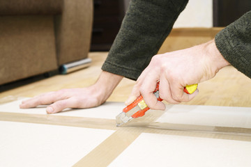 Unpacking box with knife