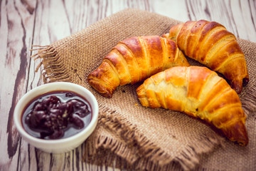 fresh croissants with jam for breakfast