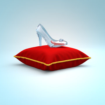 Cinderella glass slipper on the red pillow side view