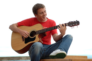 young man playing guitar