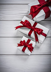 Packed present boxes on wooden board holidays concept