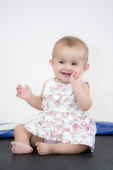 Fototapeta premium Portrait baby on the bed in her room