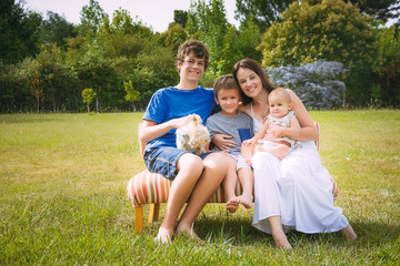 Fototapeta premium Happy mother and children a park