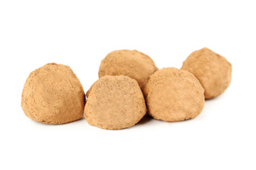 Sweet chocolate truffle isolated on a white