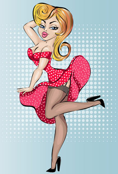 Sexy pin-up girl in red dress
