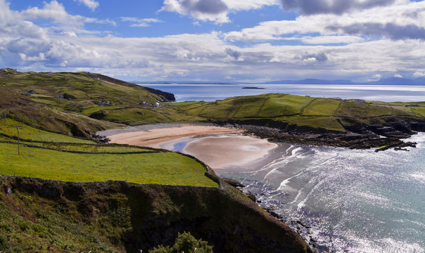 Ocean cliffs and beach in sunne day