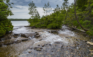 small flowing waterfalls in nature landscape