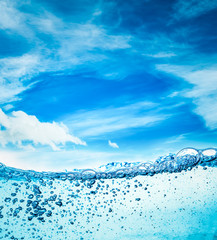 Close up water on a background of blue sky
