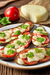 Baked eggplant with tomatoes and cheese