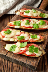 Baked eggplant with tomatoes and cheese