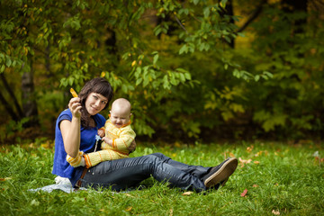 Fototapeta premium Mama plays with her daughter