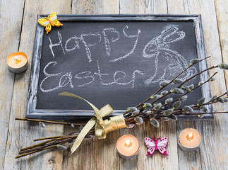 Framed blackboard with paint of rabbit, pussy-willow and candles