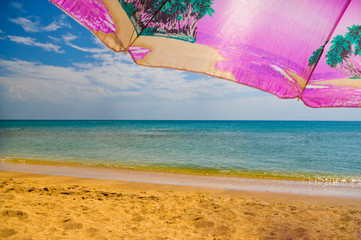 Rest under an umbrella on the beach