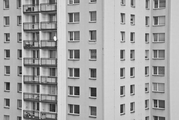Standardized monotonous facade of block of flats made during era of socialism in Czech Republic