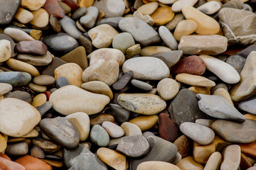 Round smooth stones of different color